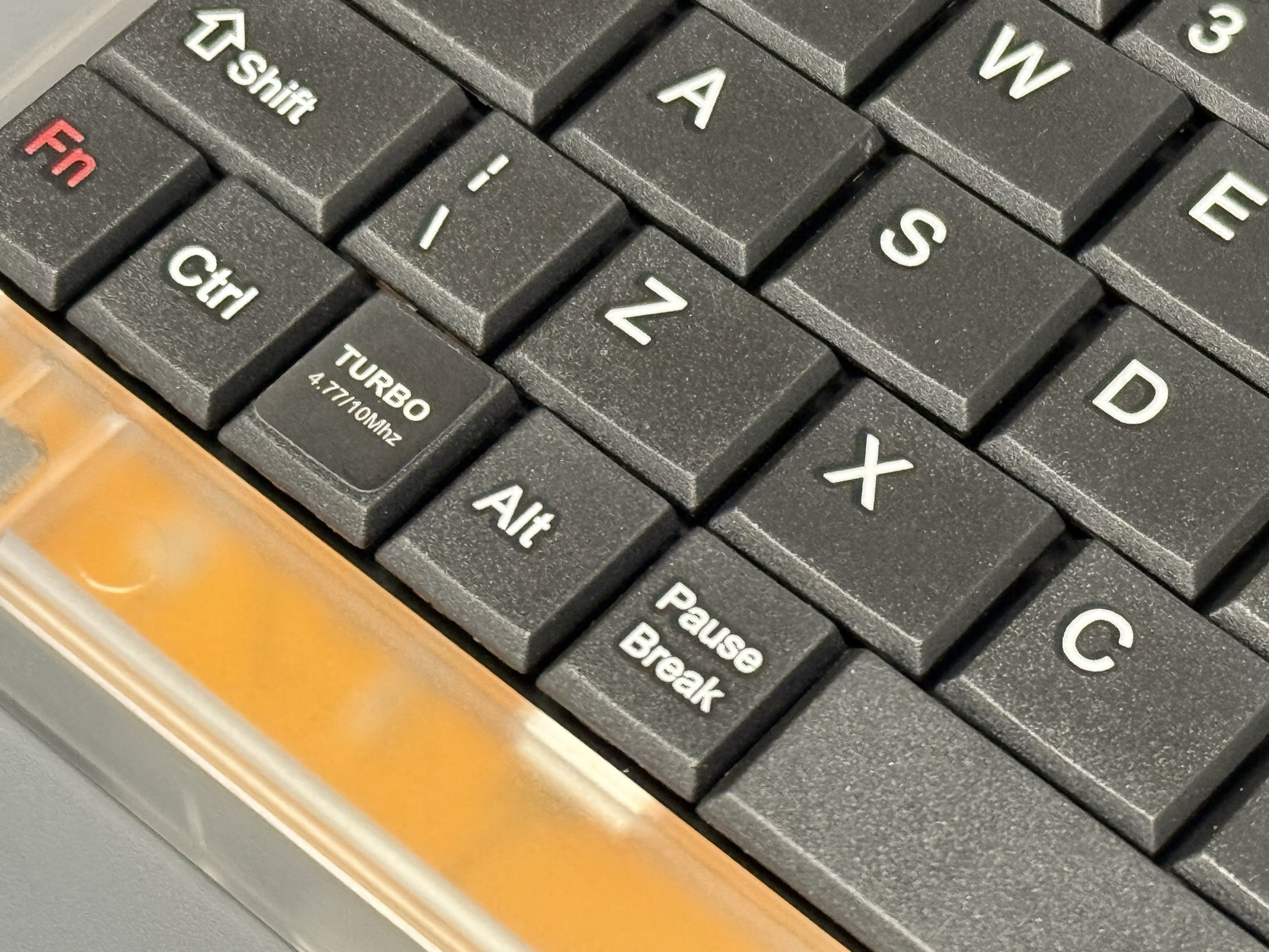 Photo of Pocket 8086's horrible little baby keyboard keys, directly stolen from Stephen Hackett at 512 Pixels